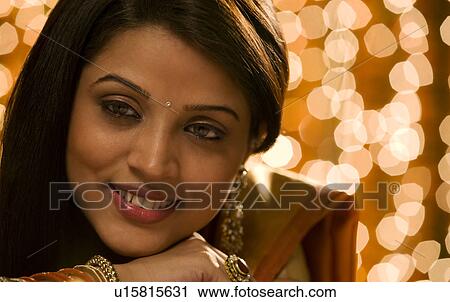 Stock Image - Portrait of a woman . Fotosearch