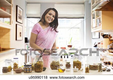 Portrait of a woman with pickle jars View Large Photo Image Stock Photo - Portrait of a woman with pickle jars . Fotosearch