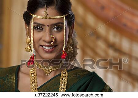 Stock Photography - Portrait of beautiful Maharashtrian bride smiling . Fotosearch