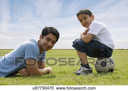 Portrait of father and son View Large Photo Image Stock Image - Portrait of father and son . Fotosearch