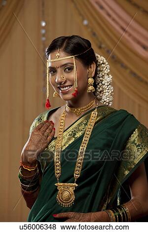 Stock Photo - Portrait of gorgeous young bride smiling . Fotosearch