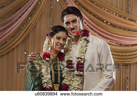 Portrait of happy newly married couple smiling together View Large Photo Image Picture - Portrait of happy newly married couple smiling together . Fotosearch