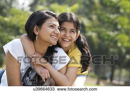 Portrait of mother and daughter View Large Photo Image Stock Image - Portrait of mother and daughter . Fotosearch