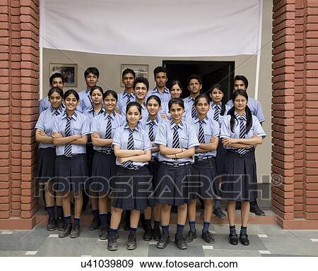 Portrait of students in front of a school View Large Photo Image Stock Photo - Portrait of students in front of a school . Fotosearch