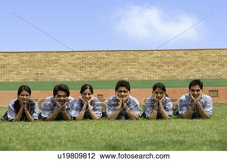 Portrait of students in the garden of a school View Large Photo Image Stock Image - Portrait of students in the garden of a school . Fotosearch