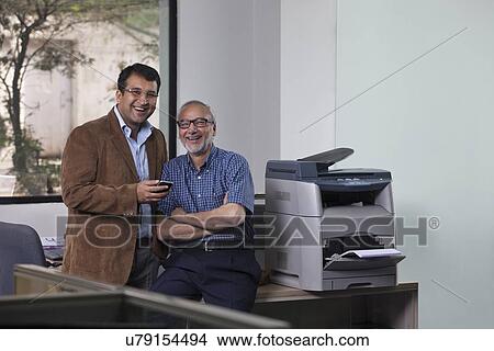 Picture - Portrait of two men smiling. Fotosearch