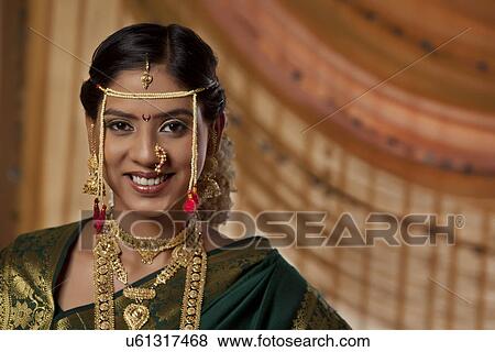Portrait of young Maharashtrian bride smiling View Large Photo Image Stock Photo - Portrait of young Maharashtrian bride smiling . Fotosearch
