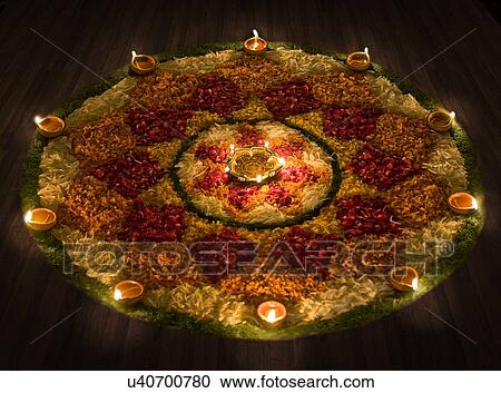Stock Image - Rangoli and diyas . Fotosearch