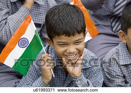 School boy holding the Indian Flag View Large Photo Image Stock Image - School boy holding the Indian Flag . Fotosearch