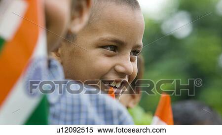 Stock Photography - School boy smiling . Fotosearch