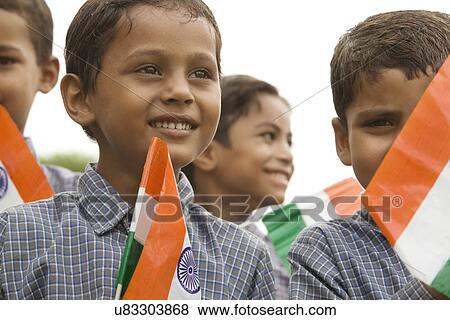 School boys holding the Indian flag View Large Photo Image Stock Photo - School boys holding the Indian flag . Fotosearch