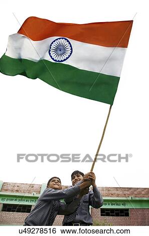 School boys holding the Indian Flag View Large Photo Image Stock Photograph - School boys holding the Indian Flag . Fotosearch