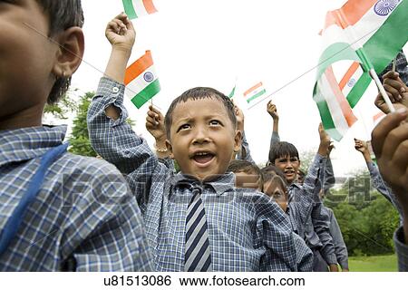 School boys holding the Indian flag View Large Photo Image Stock Photograph - School boys holding the Indian flag . Fotosearch