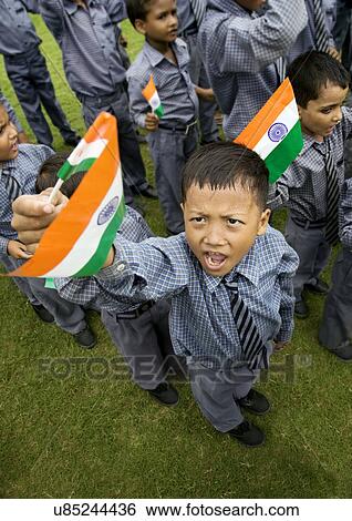 School boys holding the Indian flag View Large Photo Image Stock Photograph - School boys holding the Indian flag . Fotosearch