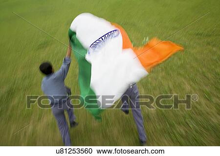 School boys running with the Indian flag View Large Photo Image Stock Image - School boys running with the Indian flag . Fotosearch