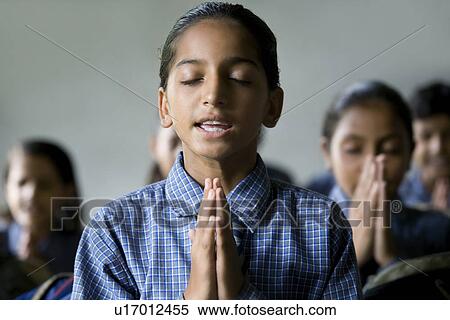 School girls praying View Large Photo Image Stock Photography - School girls praying . Fotosearch