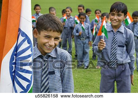 Stock Photo - School kids celebrating Independence Day . Fotosearch