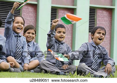 School kids holding the Indian flag View Large Photo Image Stock Image - School kids holding the Indian flag . Fotosearch