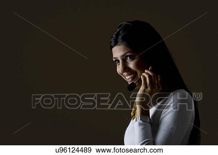 Secretary with headphones and mic View Large Photo Image Stock Photo - Secretary with headphones and mic . Fotosearch