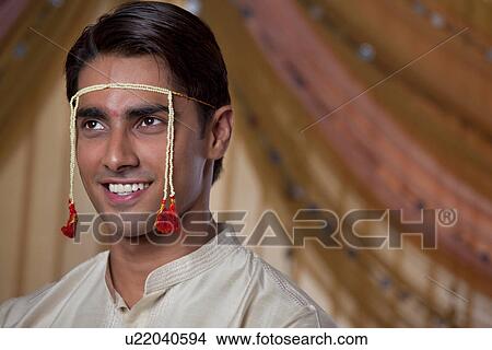 Smiling young Maharashtrian groom View Large Photo Image Picture - Smiling young Maharashtrian groom . Fotosearch