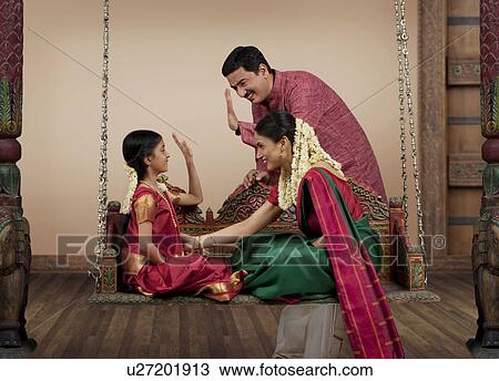 South Indian family enjoying themselves View Large Photo Image Stock Image - South Indian family enjoying themselves . Fotosearch