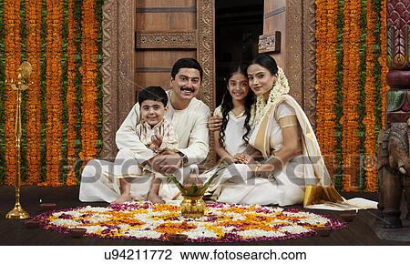 South Indian family with flower rangoli View Large Photo Image Stock Image - South Indian family with flower rangoli . Fotosearch