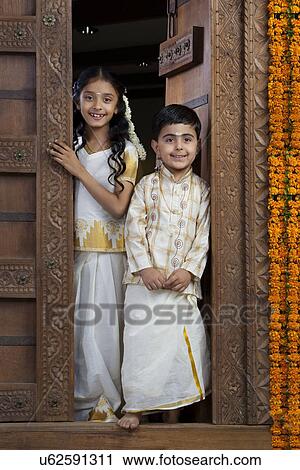 South Indian girl standing with her brother View Large Photo Image Stock Image - South Indian girl standing with her brother . Fotosearch
