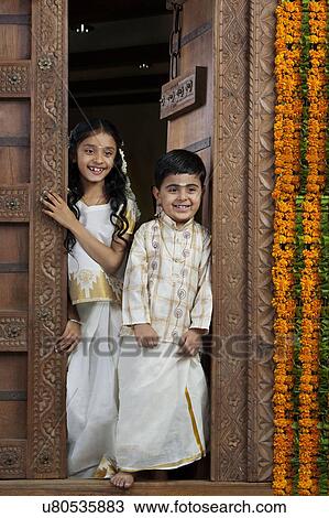 South Indian girl standing with her brother View Large Photo Image Stock Image - South Indian girl standing with her brother . Fotosearch