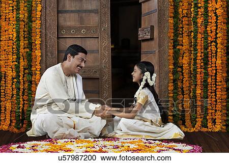 South Indian man and daughter View Large Photo Image Stock Image - South Indian man and daughter . Fotosearch