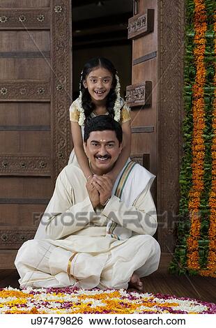 South Indian man and daughter View Large Photo Image Stock Photograph - South Indian man and daughter . Fotosearch