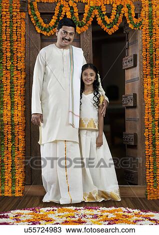 South Indian man with his daughter View Large Photo Image Stock Image - South Indian man with his daughter . Fotosearch