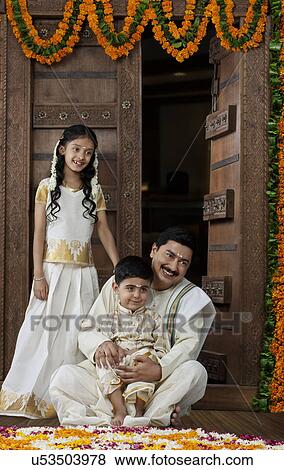 South Indian man with son and daughter View Large Photo Image Stock Photo - South Indian man with son and daughter . Fotosearch