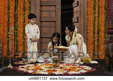 Stock Photo - South Indian woman with son and daughter . Fotosearch