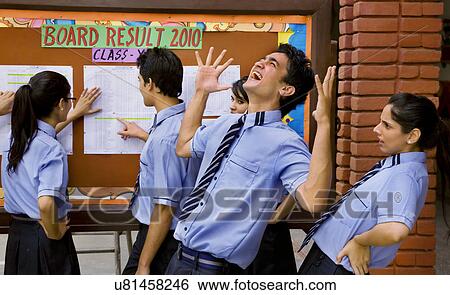 Stock Photograph - Student rejoicing after the exam results . Fotosearch