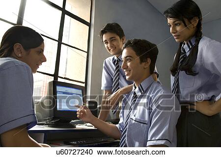 Students talking in a computer lab View Large Photo Image Stock Image - Students talking in a computer lab . Fotosearch