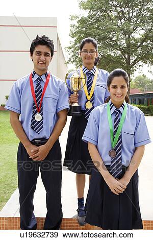 Students with medals and trophy View Large Photo Image Stock Photo - Students with medals and trophy . Fotosearch
