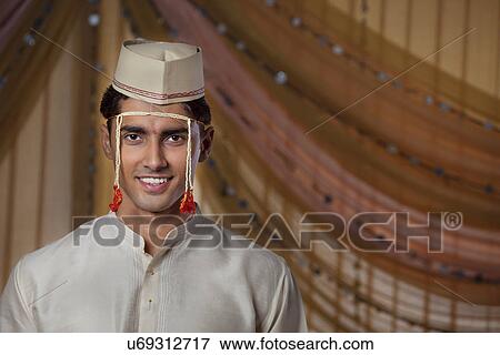 Young Maharashtrian groom smiling View Large Photo Image Stock Photo - Young Maharashtrian groom smiling . Fotosearch