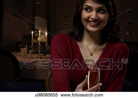 Young woman with a wine glass View Large Photo Image Stock Photography - Young woman with a wine glass . Fotosearch