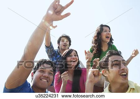 Youngsters cheering View Large Photo Image Stock Image - Youngsters cheering . Fotosearch