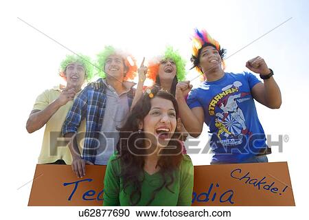 Youngsters cheering View Large Photo Image Stock Image - Youngsters cheering . Fotosearch