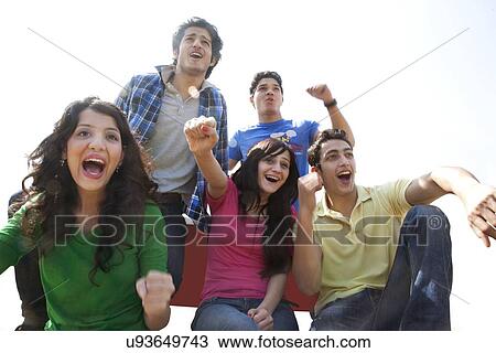 Youngsters cheering View Large Photo Image Stock Image - Youngsters cheering . Fotosearch