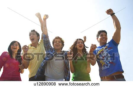 Youngsters cheering View Large Photo Image Stock Photo - Youngsters cheering . Fotosearch