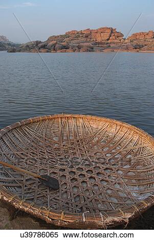 Bamboo coracle near the Tungabhadra River View Large Photo Image Stock Photography - Bamboo coracle near the Tungabhadra River . Fotosearch