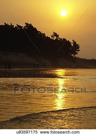 Beach at sunset View Large Photo Image Stock Photography - Beach at sunset . Fotosearch
