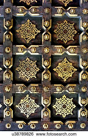 Stock Photograph - Brass and wooden door. Fotosearch