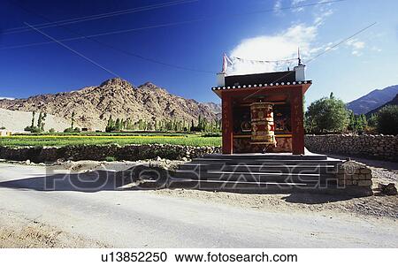Stock Image - Buddhist wheel. Fotosearch
