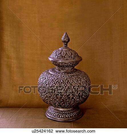 Carved silver pot View Large Photo Image Stock Image - Carved silver pot. Fotosearch