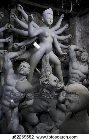 Clay idol making process for Durga Puja View Large Photo Image Stock Image - Clay idol making process for Durga Puja . Fotosearch