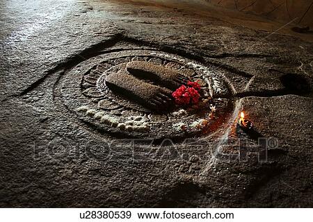 Stock Photo - Engraved footprints of Srutakevali Bhadrabahu . Fotosearch