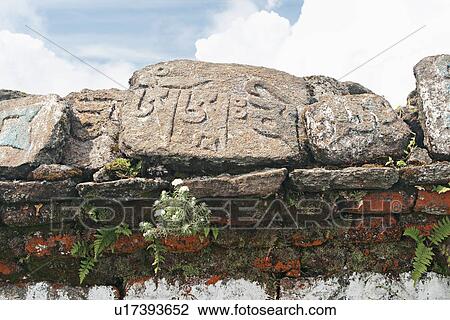 Stock Image - Engravings on a stone . Fotosearch